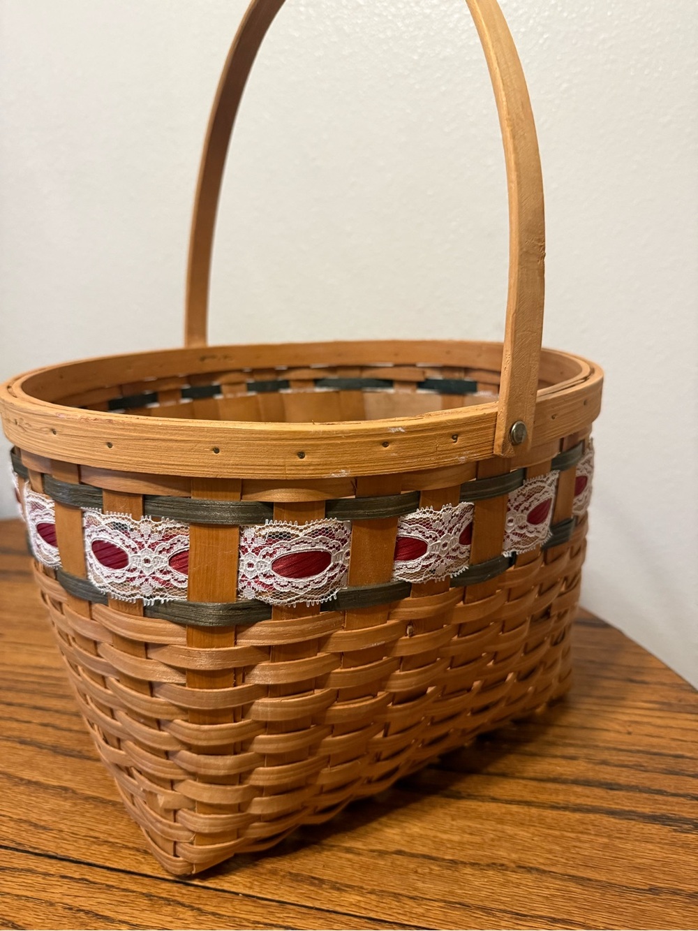Vintage hand woven picnic basket with lace trimming detail